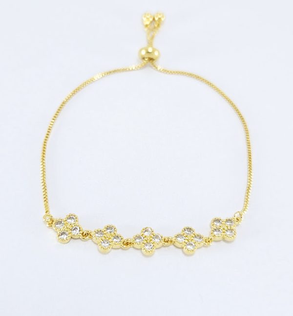 Pulseira trevos pedras cristal com detalhes dourado