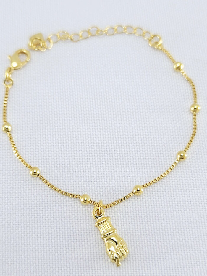 Pulseira infantil com pingente figa dourado