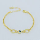 Pulseira infantil coração vazado e olho grego