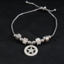 Pulseira bolas prateada e cravejada com pingente estrela detalhe vazado