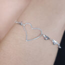 Pulseira elos torcido com coraçao vazado