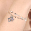 Pulseira dupla elos oval curvado com trevo liso e vazado