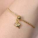 Pulseira coração dourado com ponto de luz