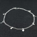 Tornozeleira com estrela chapeada e ponto de luz
