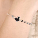 Pulseira elos chapeados com borboleta preto esmaltada