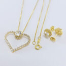 Conjunto pingente coração vazado com pedra central cristal