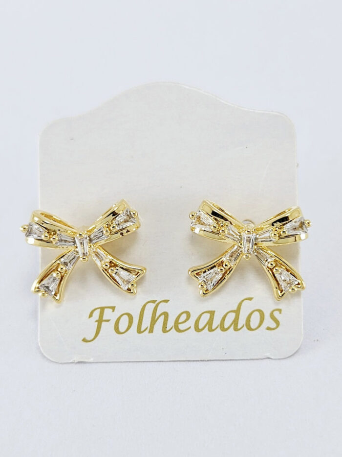 Brinco laço detalhe pedra cristal