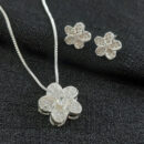 Conjunto flor cravejado