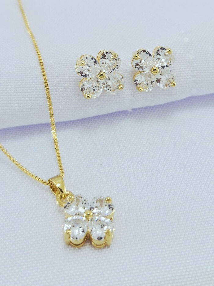 Conjunto flor com pedra cristal