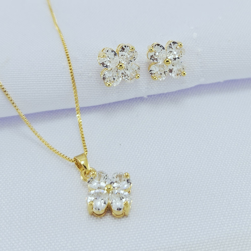 Conjunto flor com pedra cristal