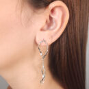 Brinco fio ondulado duplo