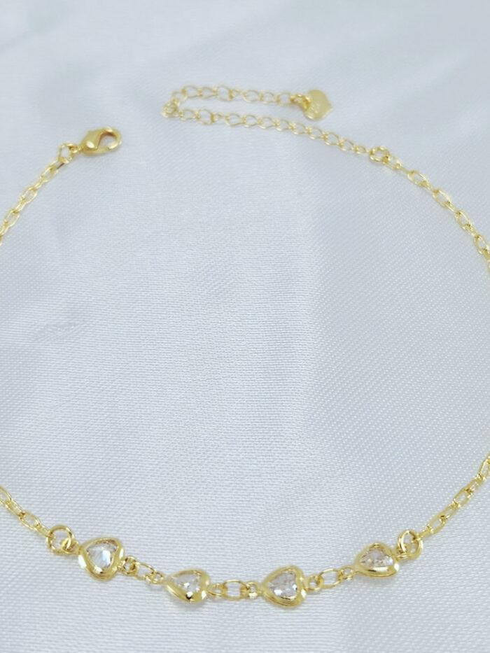 Tornozeleira elos cartier com corações cristal