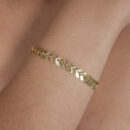 Pulseira estilo escamas texturizada dourada