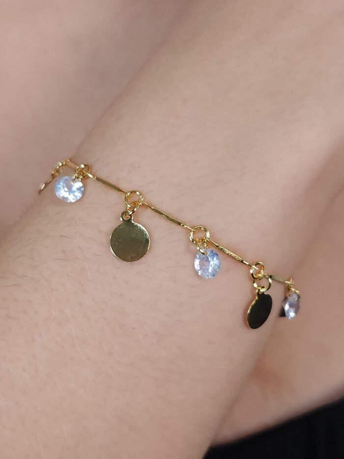 Pulseira cristais e medalhas