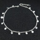 Tornozeleira com medalhas lisas e pontos de luz