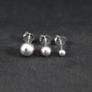 Trio de brincos bolas prateadas