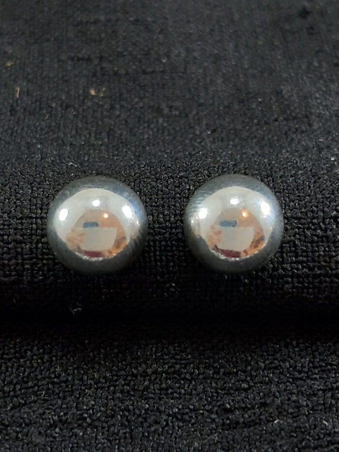 Brinco bola prateada