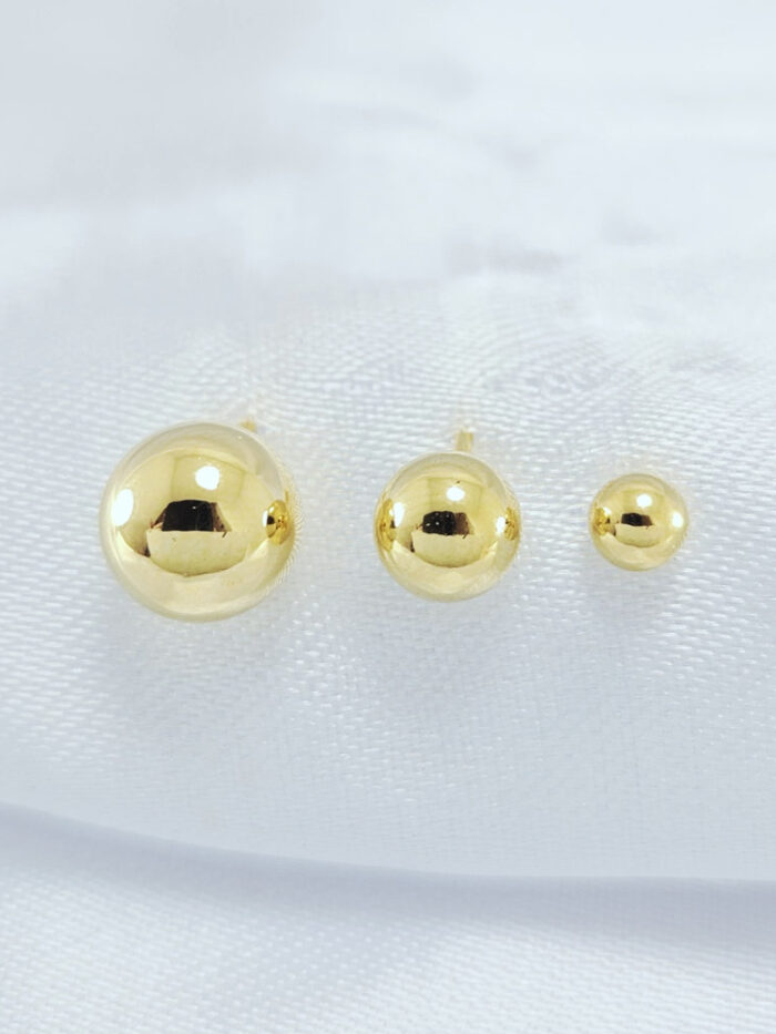 Trio de brincos bola dourado