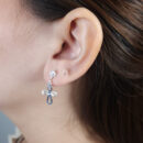 Brinco base ponto de luz pêndulo cruz