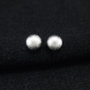 Brinco bola prateada