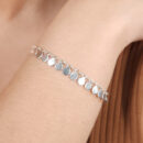 Pulseira elos oval com bolas chapeada e detalhada