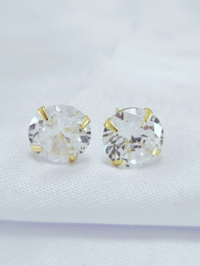 Brinco ponto de luz redondo