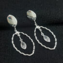 Brinco oval ondulado vazado pêndulo ponto de luz