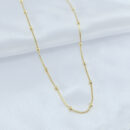 Gargantilha chocker com bolas  dourada lisa