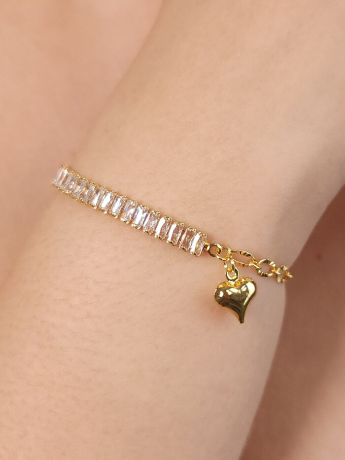 Pulseira riviera com pedras baguete elos martelados