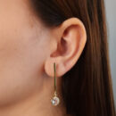 Brinco caninho com pedra cristal pêndulo