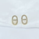 Brinco oval fio cravejado