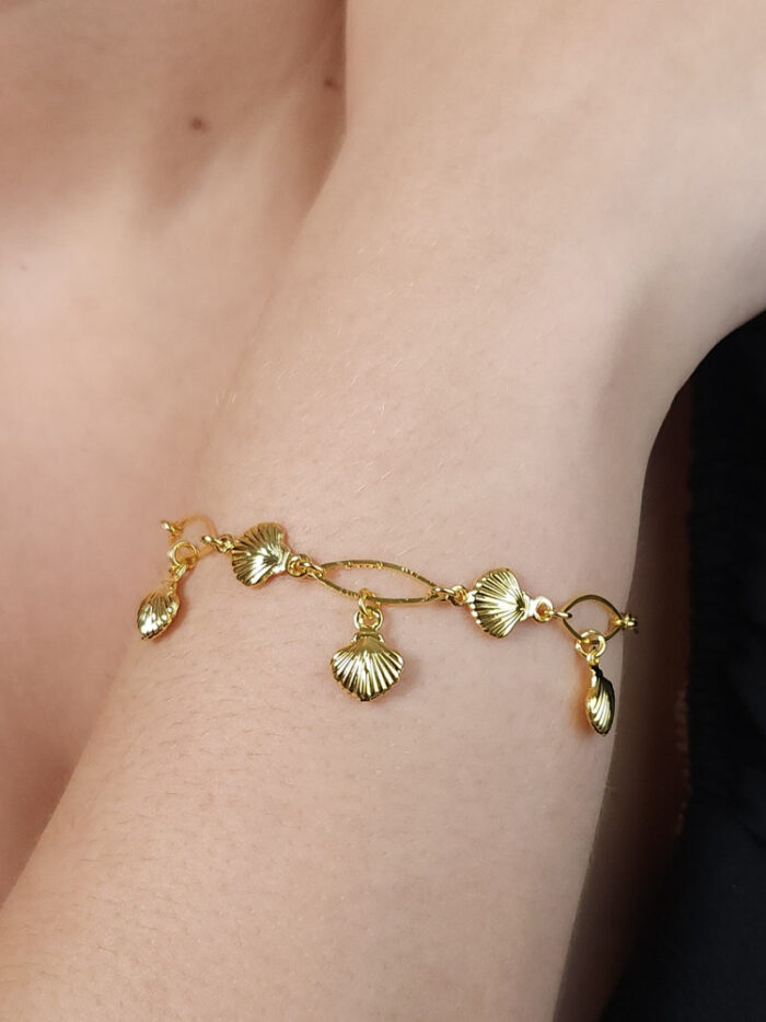 Pulseira elos ovais e navetes com conchas douradas