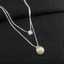 Gargantilha dupla perola com ponto de luz