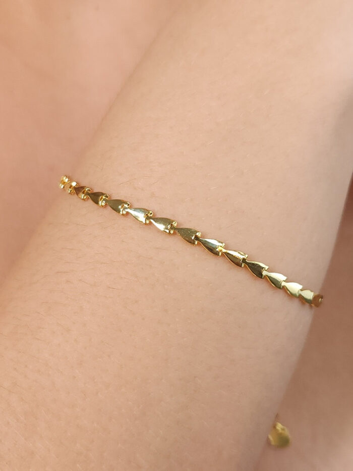 Pulseira setas dourada
