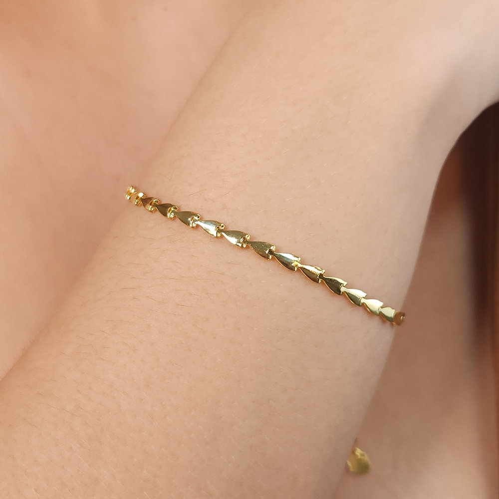 Pulseira setas dourada