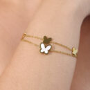 Pulseira dupla borboleta branca esmaltada e dourada