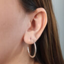 Argola lisa prateada aberta