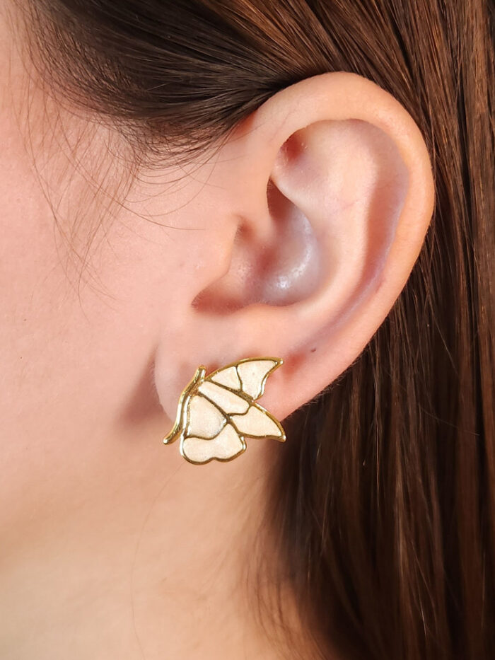 Brinco base borboleta cintilante