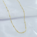 Gargantilha veneziana com bolinhas douradas