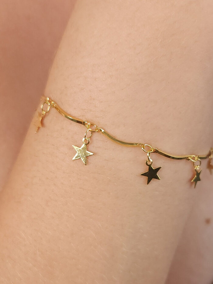 Pulseira caninho com estrelas pêndulo