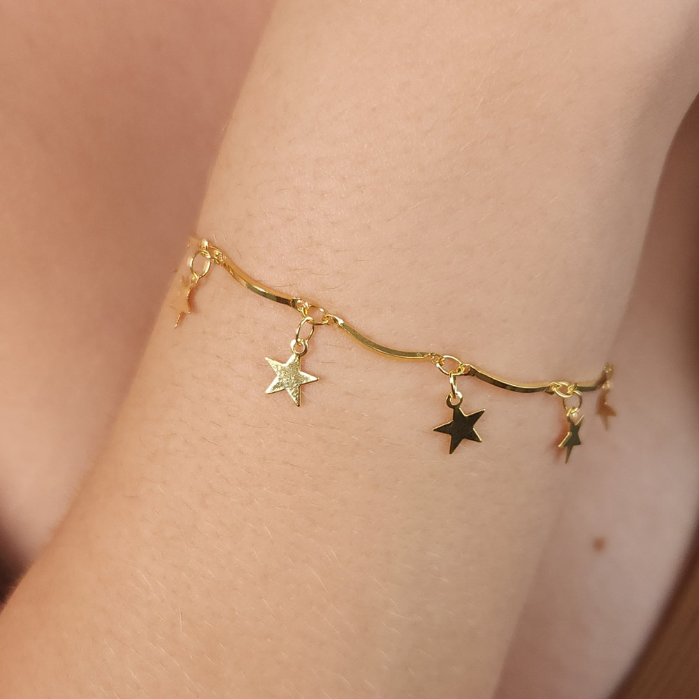 Pulseira caninho com estrelas pêndulo