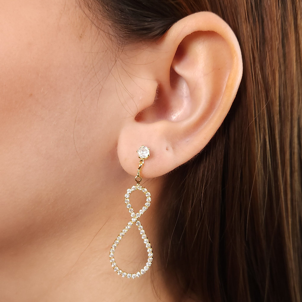 Brinco ponto de luz pêndulo fio curvado cravejado