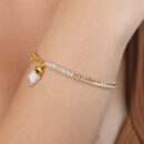 Pulseira pedra baguete e elo cartier com trevo branco