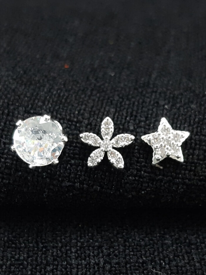 Trio de brincos ponto de luz com flor e estrela cravejada