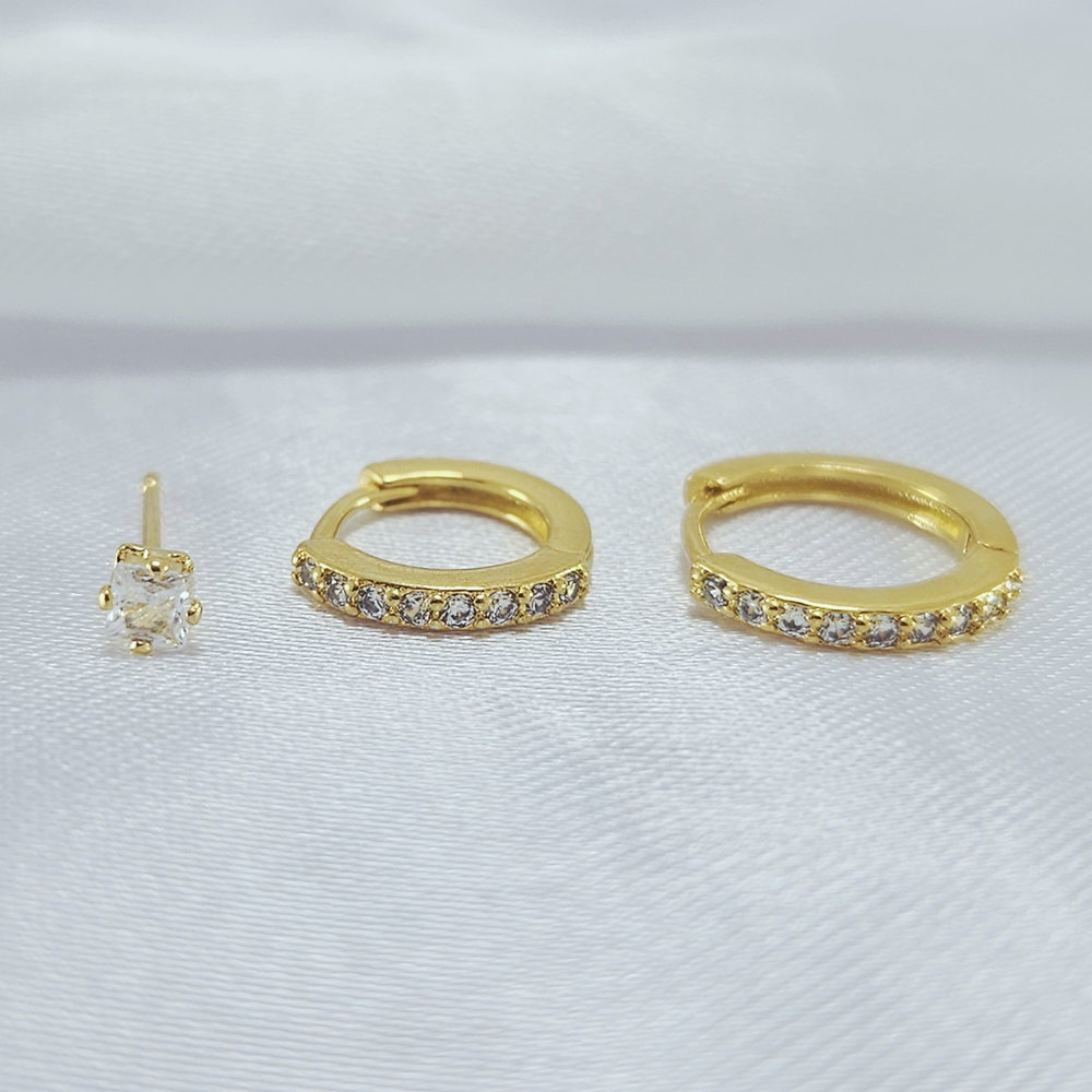 Brinco trio ponto de luz com argola cravejada