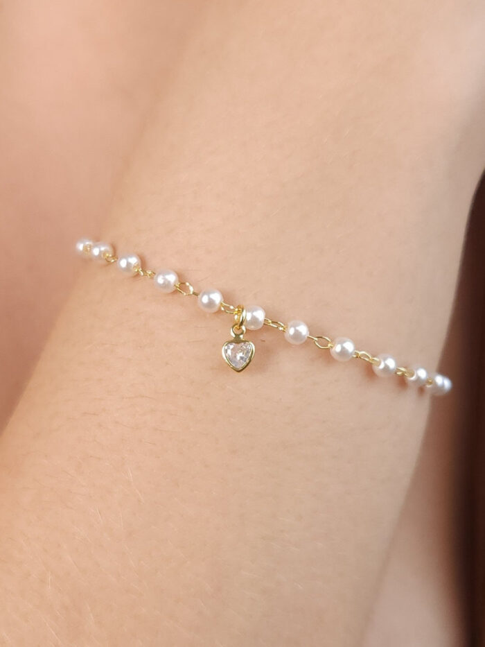 Pulseira pérolas com pêndulo coração cristal