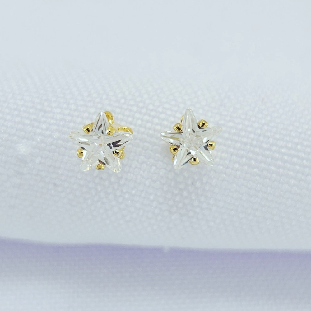 Brinco ponto de luz com estrela