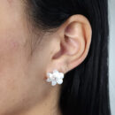 Brinco flor detalhe ponto de luz