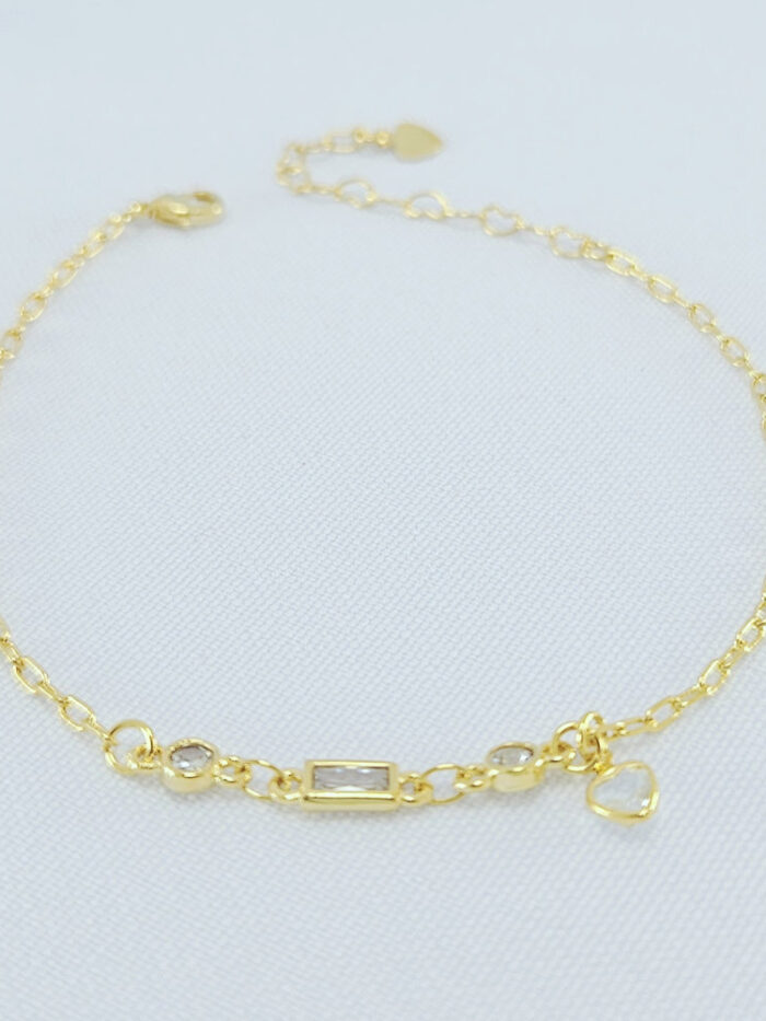 Pulseira cristal retangular com ponto de luz e coração pêndulo