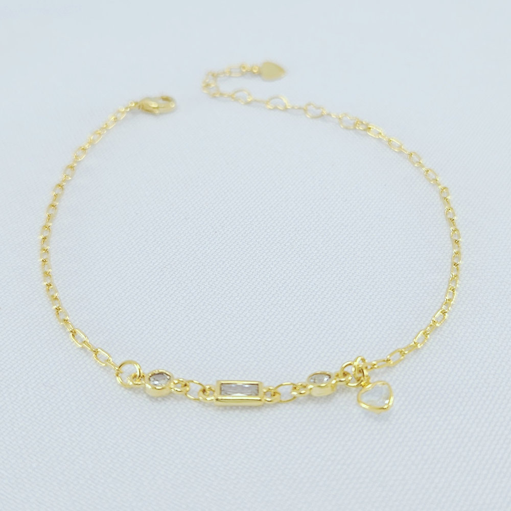 Pulseira cristal retangular com ponto de luz e coração pêndulo